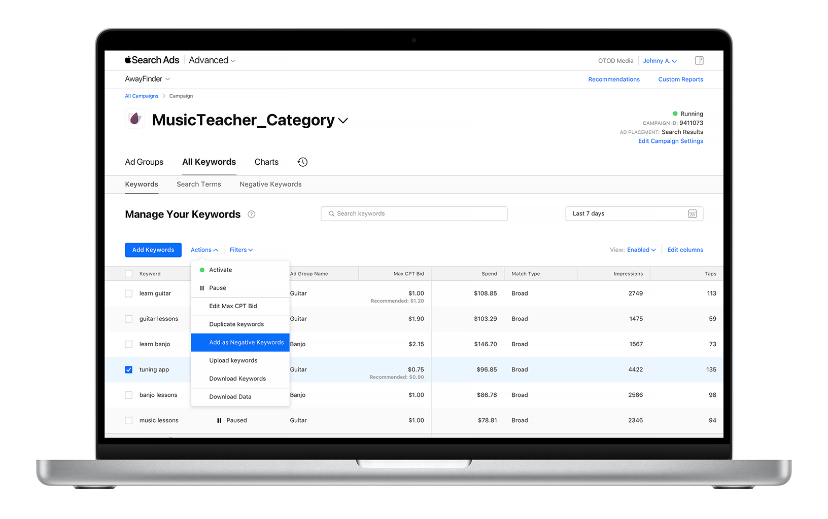 The Campaigns dashboard is open for an example app, Music Teacher. The checkbox next to the keyword "tuning app" is selected, the Actions menu is open, and Add as Negative Keywords is selected.
